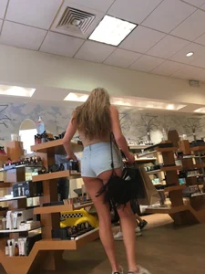 Amazing Tall Hot Girl in High-Waisted Mini Shorts with Great Ass and Legs Store Creepshots