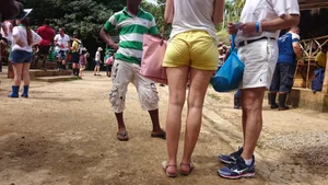 Milf in yellow shorts with vpl and a wedgie