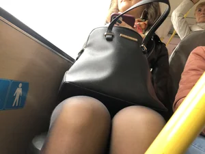 Knees of a Candid Milf in Black Pantyhose Public Bus Closeup