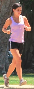 Hot brunette running in short shorts with vpl