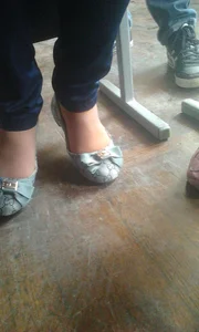 Under Desk Closeup Creepshot of a College Teen's Feet in Pantyhose And Flats