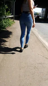 Redhead with a nice ass in tight jeans walking