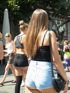 Sexy ass girl walking with friends in short shorts showing her nice ass cheeks
