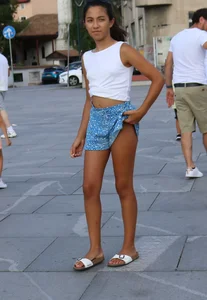 Skinny girl wearing shorts on the street