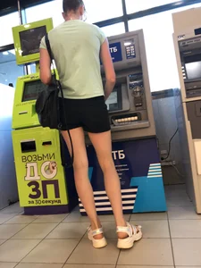 Creepshots of a Tall and Very Skinny Girl in Shorts and Sandals With Sexy Thin Legs Using an ATM