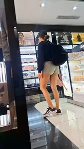 Latina green short showing cheecks [OC]