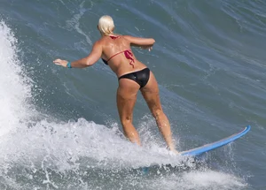 Candid surfer babes on the beach and in bikinis