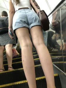 Little Sexy Booty in Denim Shorts And Juicy Skinny Legs - Candid Girl on a Subway Escalator Creepshots Series