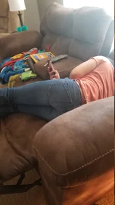 Candid Girl in Tight Blue Jeans Lying Curled Up on a Couch Home Creepshot