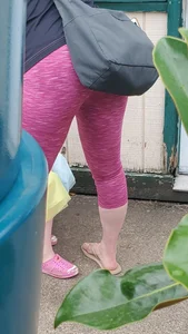 Milf shopping with a nice ass in tight maroon leggings