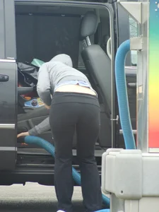 Girls cleaning their cars in jeans and pants
