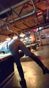 Milf in Tight Jeans playing pool
