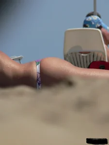 Sexy girls going topless at the beach showing off their sexy bodies