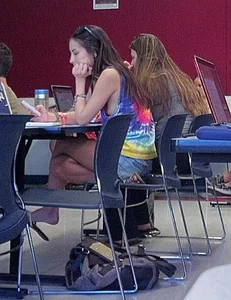 College girl in class showing sideboob with no bra on