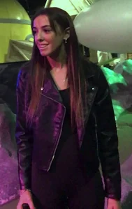 Skinny girl in a leather jacket and leggings playing mini-golf creepshots