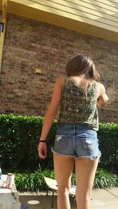 Cute friend in denim shorts showing some cheek