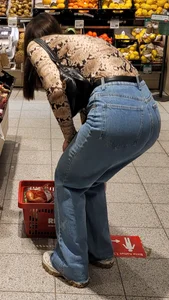 Nice booty in blue jeans at the supermarket