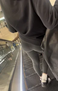 Tight curvy latina at airport pulls up pants