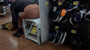 Brown shorts vtl trying on shoes