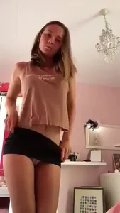 Hot non-candid girl showing her panties in her bedroom