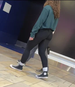 Curly haired babe in alphalete leggings