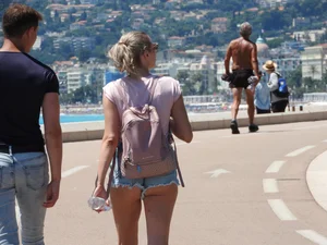 Candid cheeky blonde in short jean shorts looking hot