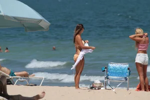 Collection of milfs in bikinis on the beach