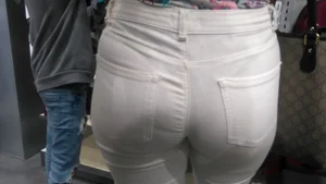 Latina with a nice ass in tight white jeans