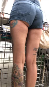 Slim tatted succubus in cheeky jean shorts