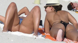 Thick lady showing her crotch at the beach