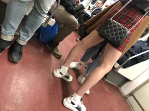 Hot slim legs in subway