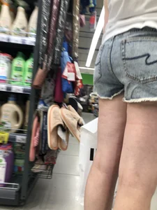 Awkward Candid Teen Girl in Jean Shorts And Sneakers at the Supermarket Creepshots Gallery