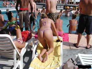 Beach voyeur girls in bikinis, thongs and topless