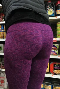 Milf shopping with a nice ass in purple leggings