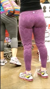 Thick Blonde in purple leggings