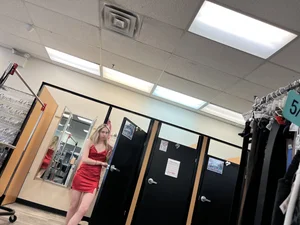 Two college babes trying on outfits