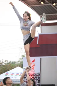 Bunch of athletic Thai cheerleaders at a competition