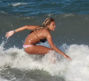 Hot surfer chicks out in the water