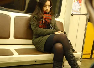 Sexy girls in skirts, stockings and upskirts on the train