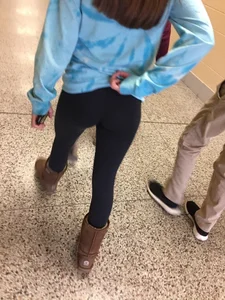 Little Ass and Thin Legs in Leggings Corridor Creepshot