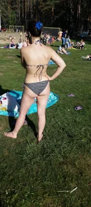 Girl in Swimsuit in the Park Candid Photo