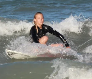 Hot surfer chicks out in the water