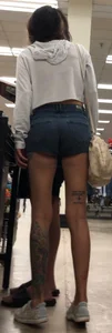 Slim tatted succubus in cheeky jean shorts