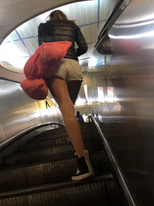 Hot Milf in Mini Shorts on the Subway Escalator and in the Train Candid Gallery