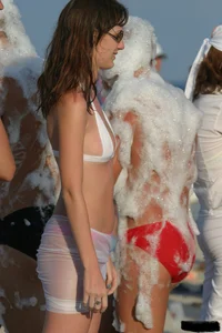 Beach voyeur girls in bikinis, thongs and topless