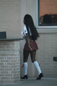 Sexy ebony Tilted Kilt employee in her uniform