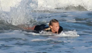 Hot surfer chicks out in the water