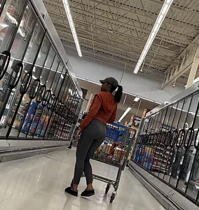 Ebony chick orange sweater + grey leggings
