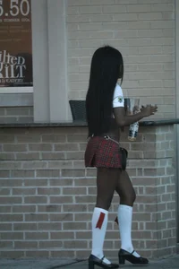 Sexy ebony Tilted Kilt employee in her uniform