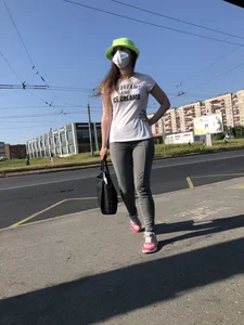 Nice candid girl wearing tight grey sweatpants, a mask and a hat